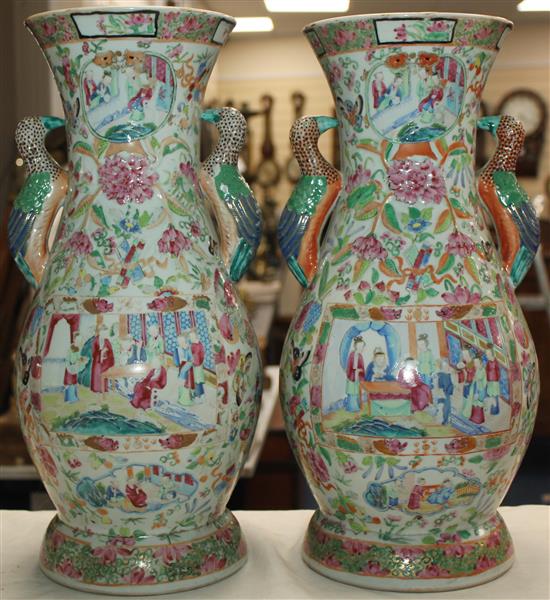 A pair of unusual Chinese Canton-decorated vases, 19th century, 44cm, bases repaired